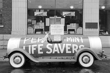 Northern Electric store front display, also showcasing a car equipped with northern electric radio